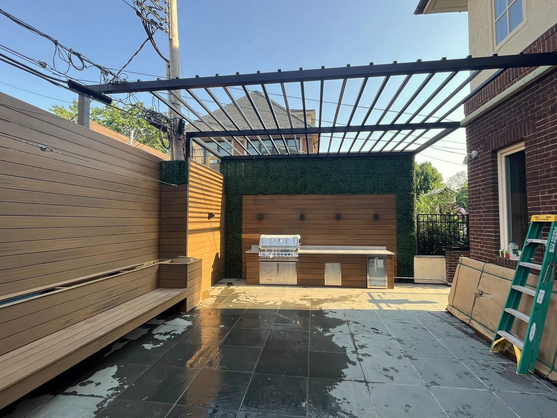Pergola Patio & Kitchen — after: Outdoor kitchen under new pergola