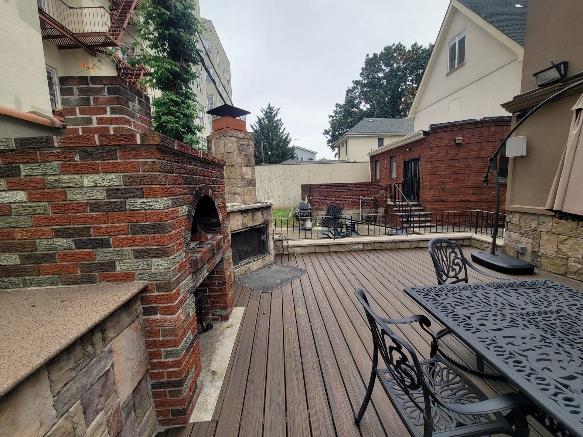 Rooftop Privacy Wall — before: Open deck before privacy wall