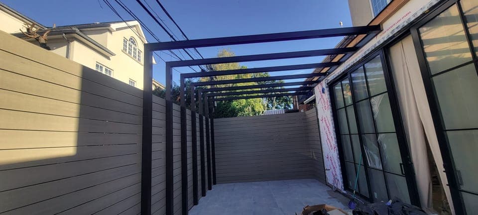 Selected Work — Steel pergola over a side-yard patio